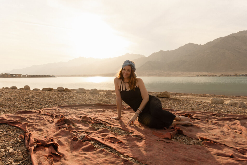 Editorial portrait of a woman in golden hour light, Dahab, Egypt.